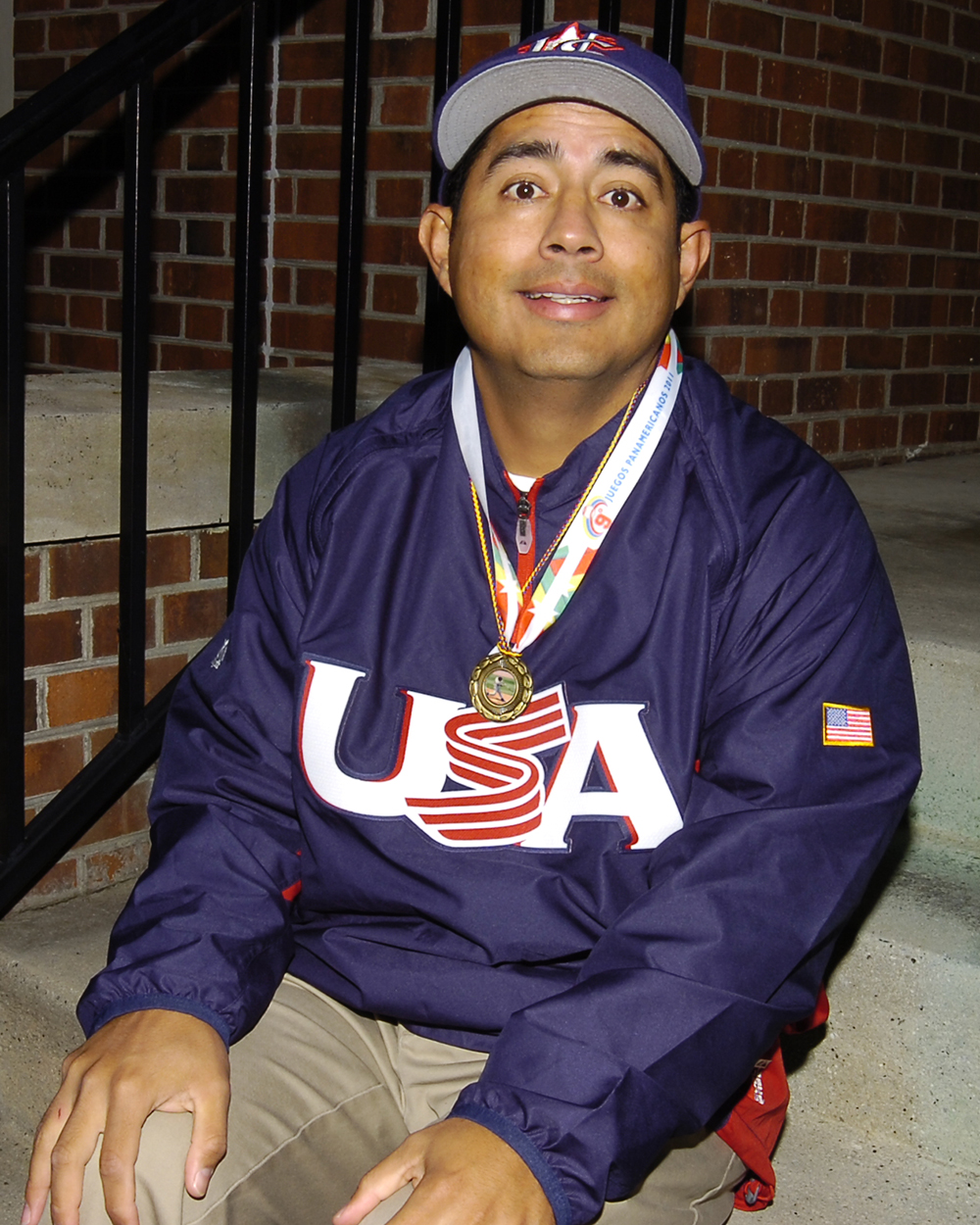 Aldo Plata '03 with his gold medal from USA Baseball.