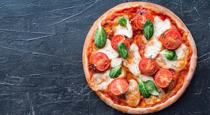 Stock photo of tomato and ricotta pizza