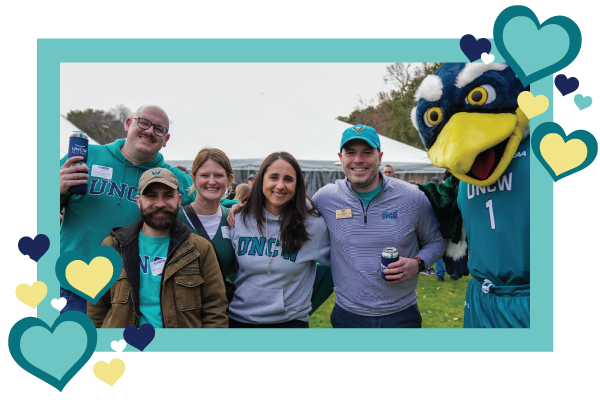 Alumni with Sammy C. Hawk at TEALate