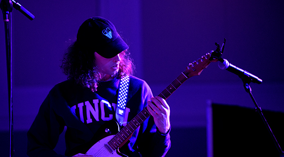 student playing guitar
