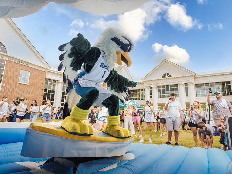 Sammy riding inflateable surfboard