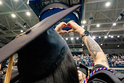 Graduate at commencement