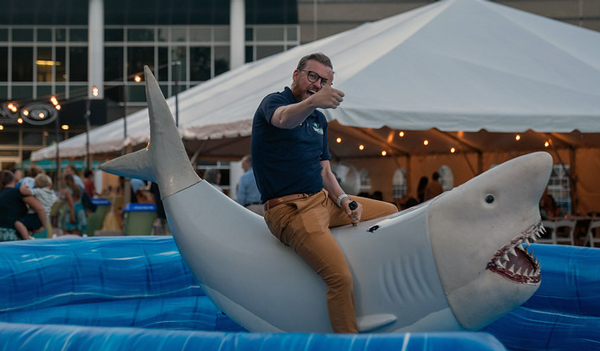Alum riding mechanical shark