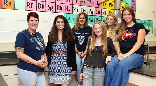 A photo of Lauren Tippett with other YSA Member