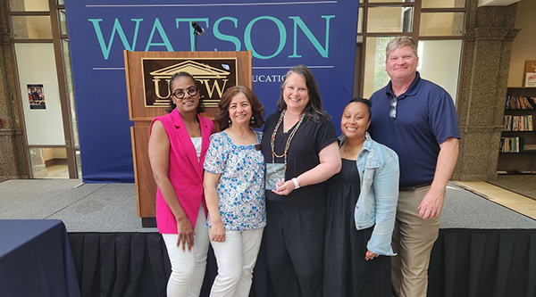 Amy Blessing receiving the Roy E. Harkin Award