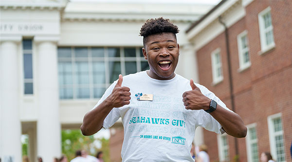 Cody Brandon '24 at the Seahawks Give event