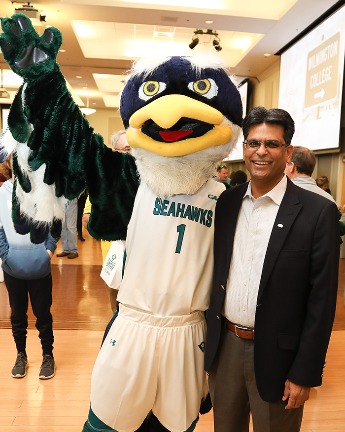 Chancellor Aswani K. Volety poses for a photo with Sammy C. Hawk at Champagne Brunch.
