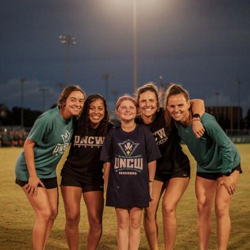 Jennifer Ludeman '13 with her teammates