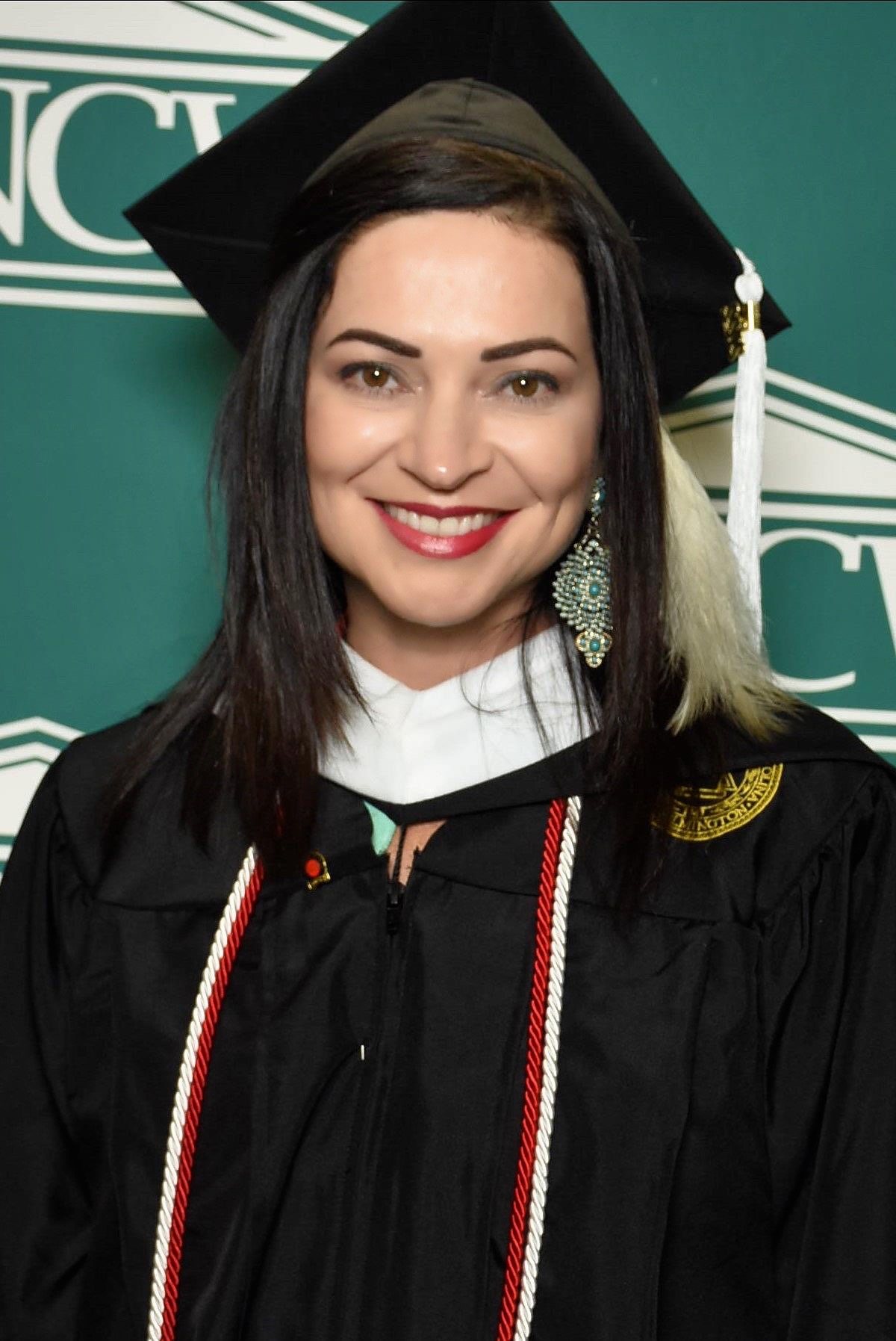 Lorna Ricotta '22M at UNCW's Commencement.