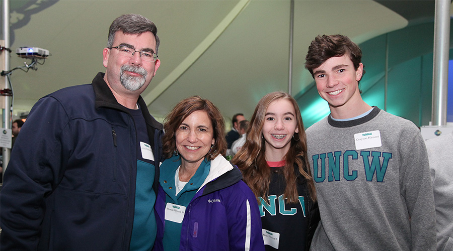Rhonda '88 and Lloyd '88 with their children at TEALgate