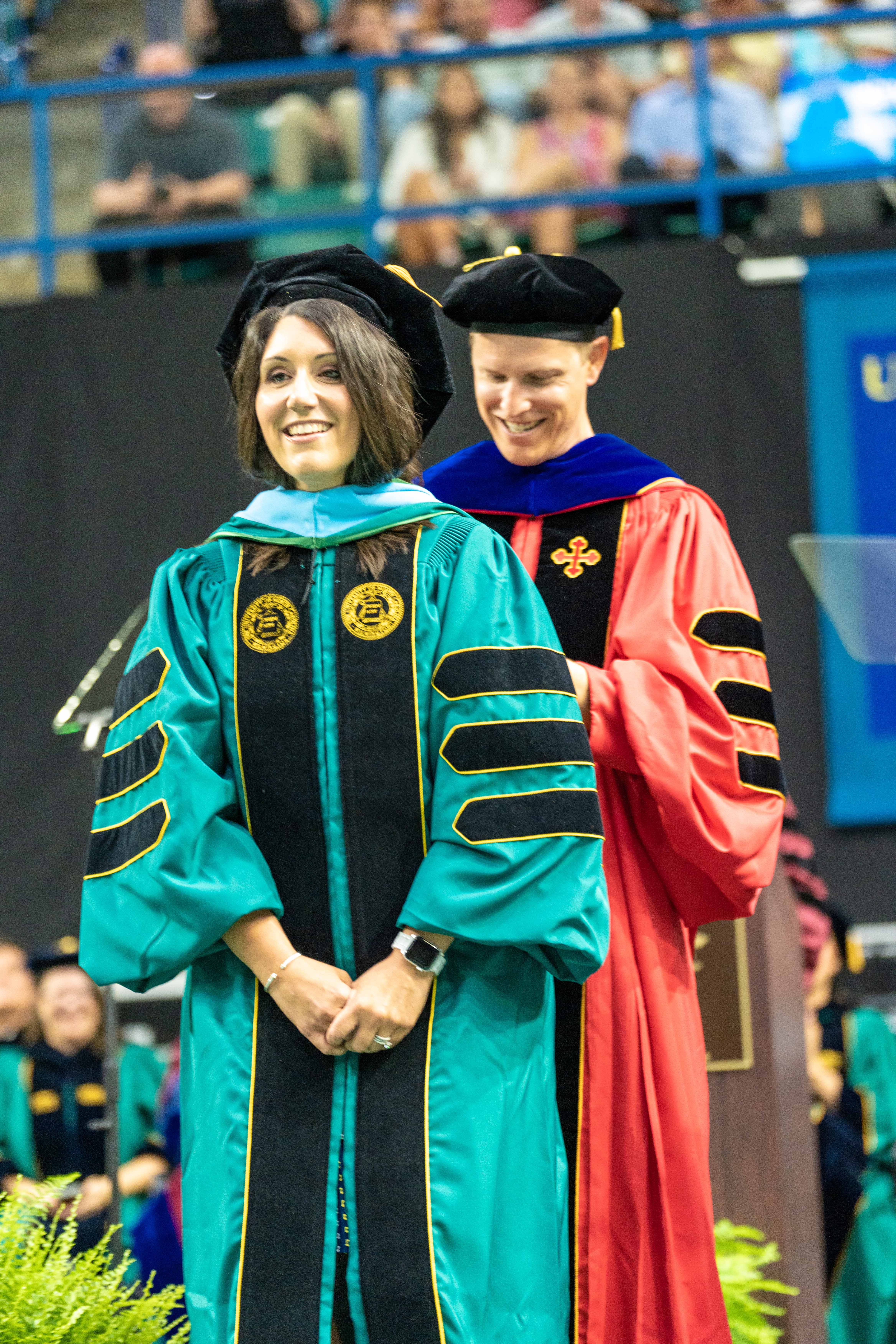 Stefanie Norris receiving her doctorate.